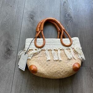 lusana amalfi tan woven crochet leather trim rattan tassel summer mini purse bag